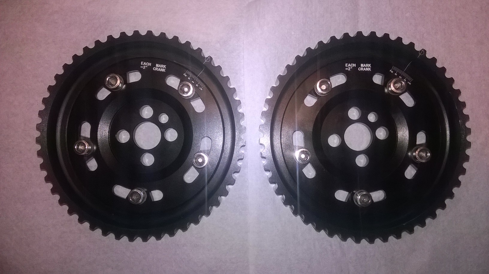 Custom pulleys and adjustable cam gears